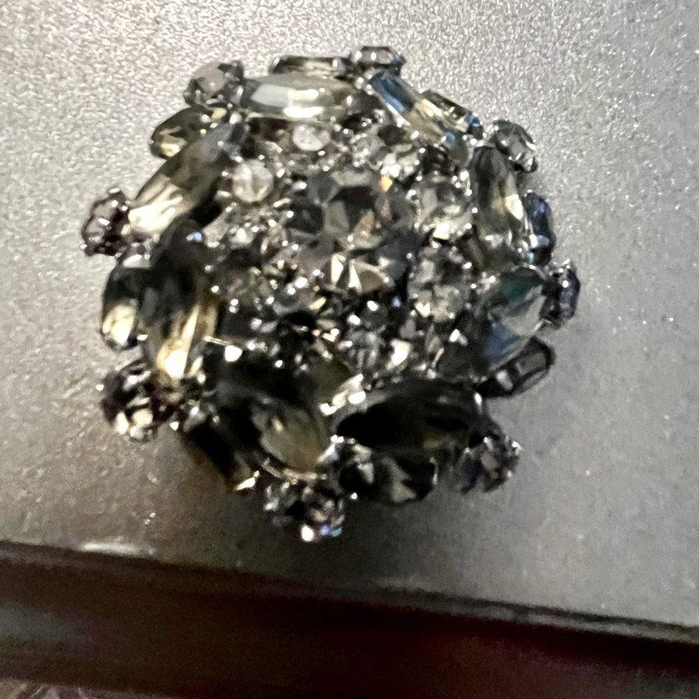 Estate sale faucet, diamond brooch, silver